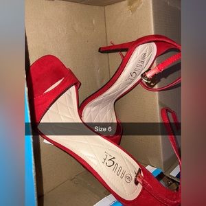 Red heels size 6.